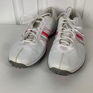Nike women’s white golf shoes size 9. Pink and grey stripes.